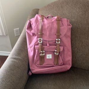 Pink Herschel backpack. Never been used.